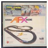 (E) Aurora AFX Electric HO Scale Racing Set.