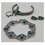 (A) Turquoise And Silver Bracelets, Rings, And