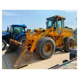 John Deere 544E pay loader showing 8485 hours