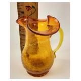 Miniature orange crackled glass pitcher