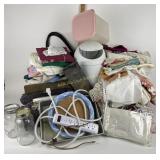 Plastic waste bin, power strip, bath towels,