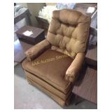 Upholstered swivel rocker. 36" high x 28" wide x