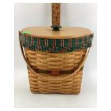 Longaberger basket with handle and lid.