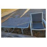 Glass top outdoor table with [4] chairs,