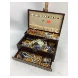 Trilevel wooden jewelry box with a various