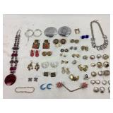 Costume jewelry rings, necklaces, and earrings