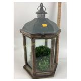 Decorative glass and wooden lantern.