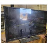 Vizio flat-screen TV with a screen size of about