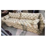 Floral patterned sofa with a classic, vintage