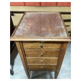 Wooden cabinet with drawers and phonograph records