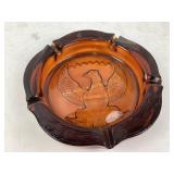 Eagle-embossed amber glass ashtray