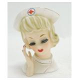 Enesco Nurse lady head vase 5 1/4", thumb repair