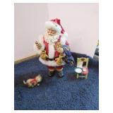 CLOTHTIQUE SANTA IN ROCKING CHAIR FIGURE