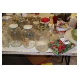 Variety of Tupperware, kitchen items, kitchen décor, variety of canning jars etc.