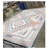 Area rug approximately 5ftx8ft