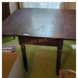 Antique Gothic revival style drop leaf table