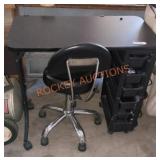 Small black desk with office chair