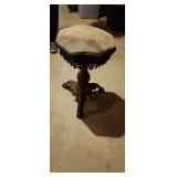 Victorian stool with metal base.  Heavy