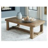 ASHLEY CABALYNN 56" LIGHT BROWN  COFFEE TABLE