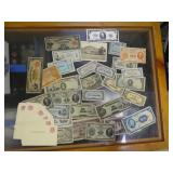 Box of Foreign Currency and Post Card