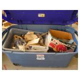 Tote of paint brushes and other