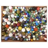 Flat of glass marbles including 35 shooters