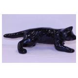 Black cat figurine w/ painted emerald eyes,