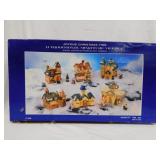 Porcelain miniature lighted Christmas village in