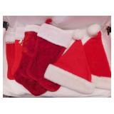 4 Christmas stockings - 2 Santa Claus hats