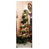 Spiral lighted Christmas tree w/ white poinsettias