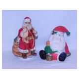 Sleeping Santa music box plays We Wish You a