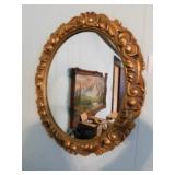 Oval wall mirror, 25" x 21"