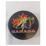 John Tavares Signed Canada Hockey Puck.