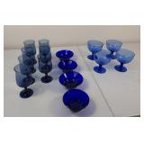 Collection of cobalt blue glasses and bowls