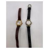 PAIR OF FOSSIL WORLD WATCHES