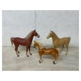 3 HORSES (2 PLASTIC AND 1 PORCELAIN)