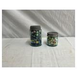 2 JARS WITH MARBLES