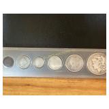 Coins Featuring A Morgan Silver Dollar