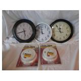 Group of 5-battery operated wall clocks