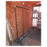 2-Metal clothes racks-one on casters