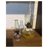 Two antique oil lamps