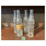 4 - NEHI soda bottles