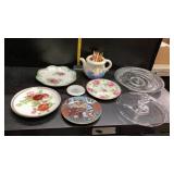 Assorted plates, teapot, serving plates