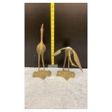 Brass crane statues