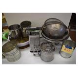 Flour sifters, grater, colanders, baking dish