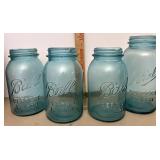 Blue canning jars minor roughness on the rims