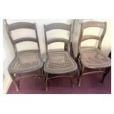 Three ladderback chairs