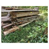 PALLET OF AIR DRIED WOOD. . TIN/TOP COVERING AND