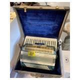 ANTIQUE DWIGHT BLUE SWIRL ACCORDIAN IN CASE