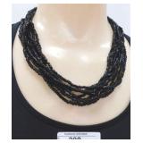 (208) 19" MULTI STRAND BLACK BEADED NECKLACE